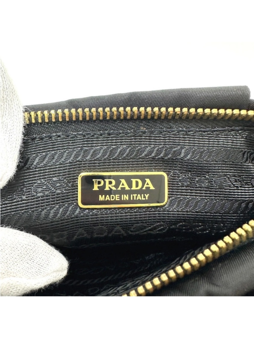 Prada Nylon Logo Ribbon Black Bow Wristlet with Gold Hardware
1N1422 - Picture 3 of 15